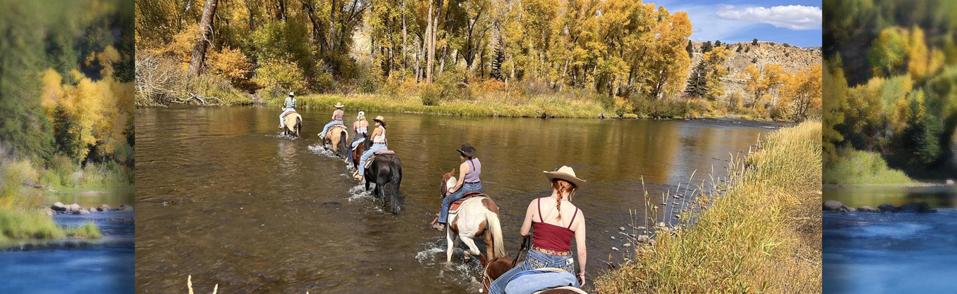 riding horseback across stream