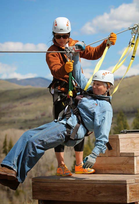 Women getting ready to zipline