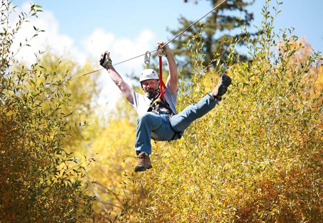 man on zip line